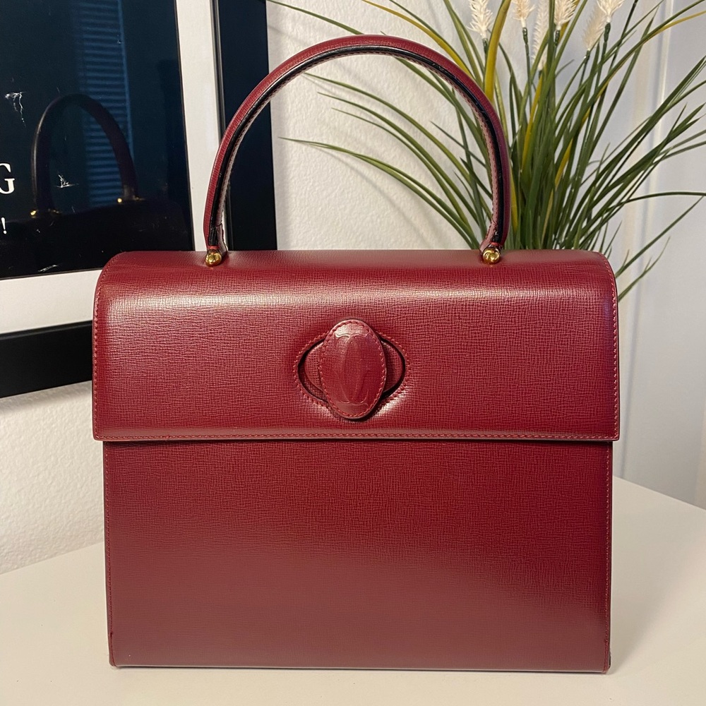 Vintage Cartier Bordeaux Leather Top Handle Bag.